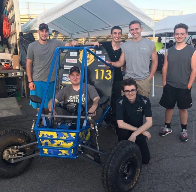Golden Bear Racing team with the car at Baja SAE Rochester 2019