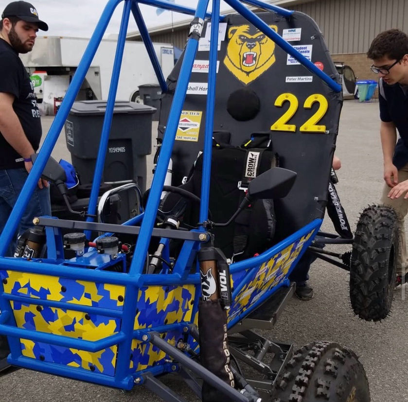 Golden Bear Racing team with the car at Baja SAE Tennessee Tech 2019