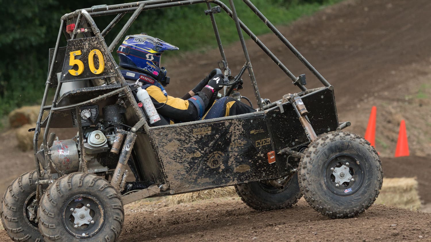 Side view of GBR4 at speed on the dirt course