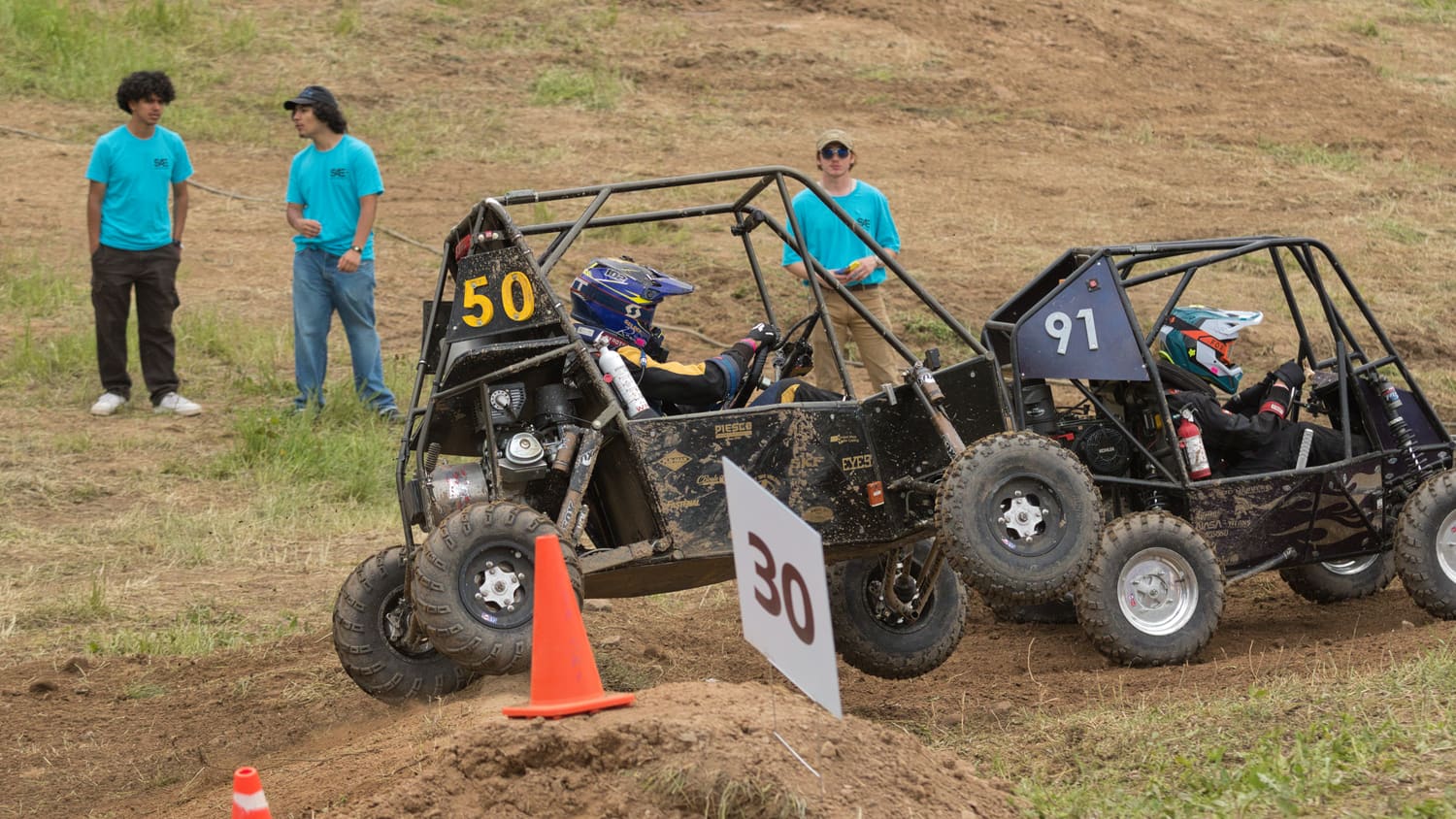 GBR4 running wheel to wheel with another team's car